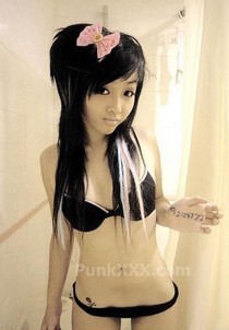 Wrapping her lips around a